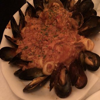 Antique Table - Amazing!Spicy marinara (they made sure you taste that spice)seafood cooked to perfection and delicious risotto!! Winning dish! Piping hot! - Italian Near Me - Winthrop, Massachusetts