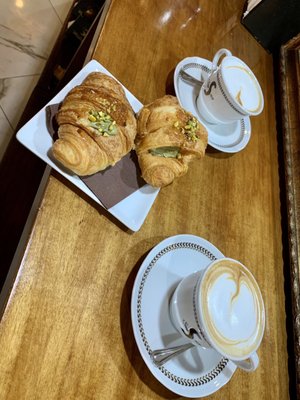 Photo of Sciascia Caffè - Rome, RM, IT. Two cappuccinos and two pistachio cream filled croissants