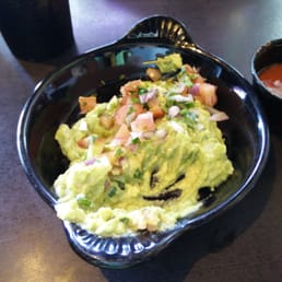 Really good guacamole with onions and jalepeño bits Really good guacamole with onions and jalepeño bits