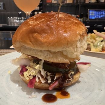 The Dotted Line - FRIED MALA CHICKEN SANDWICH Twice Fried Chicken, Tonkatsu Sauce, Honey Mala Sauce, Red Cabbage Slaw, Chili Pepper, Brioche Bun - Breakfast & Brunch Near Me - Honolulu, Hawaii
