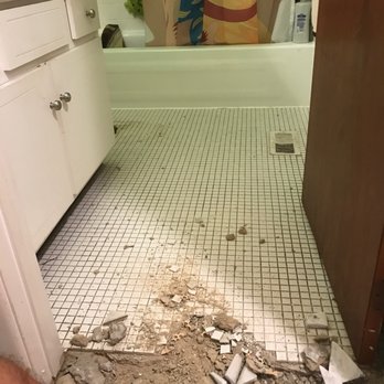Junk Police - Tile Floor Demo - Junk Removal & Hauling Near Me Junk Police - Tile Floor Demo - Junk Removal & Hauling Near Me