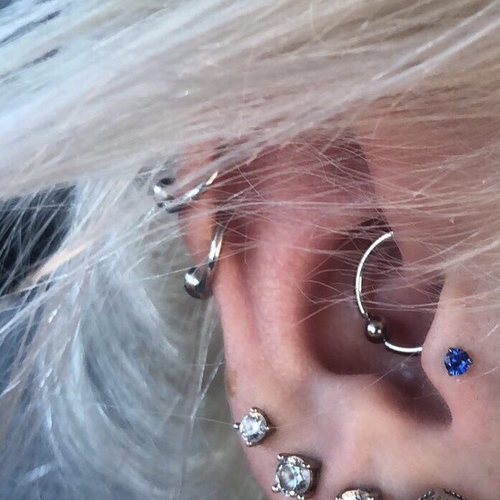 Tragus daith and two cartilage piercings done by Brooke. Tragus daith and two cartilage piercings done by Brooke.