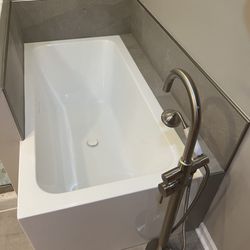 Affordable Floors and More - Tub and surround replacement