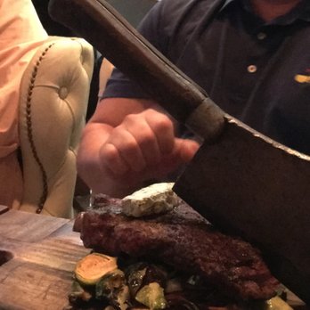 STIRR - Frontier Ribeye with a cleaver in it! - Cocktail Bars Near Me - Dallas, Texas STIRR - Frontier Ribeye with a cleaver in it! - Cocktail Bars Near Me - Dallas, Texas