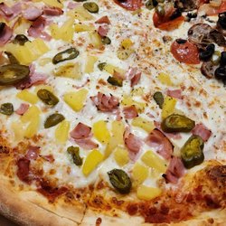 Bella Napoli Pizzeria - XL pizza: half Hawaiian + jalepenos, half Works April 2023. This plus 10 count wings total = $45. Delicious