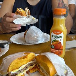 New York City Bagels & Deli Cafe - Bacon egg cheese on egg bagel