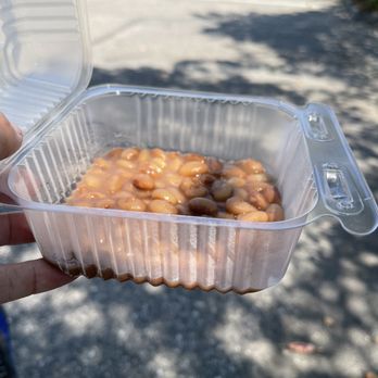 El Rosal Bakery - a hand holding a container of baked beans - Bakeries Near Me - Santa Cruz, California El Rosal Bakery - a hand holding a container of baked beans - Bakeries Near Me - Santa Cruz, California