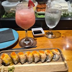 Blue Samurai Sushi Bar & Grill - Sunset roll (spicy tuna with seared salmon on top). Sparkling strawberry dream drink
