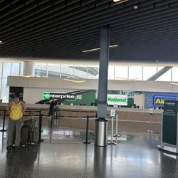 Hertz Rent A Car - No line for Enterprise, National and Alamo. But you need a reservation.