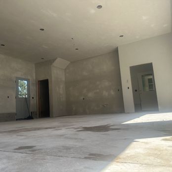 Trowel Life Plastering - Mother-in-law suite above garage finished with a medium Tuscan finish. - General Contractors Near Me