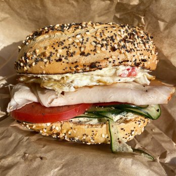 Village Bagel - Everything bagel with veggie cream cheese, turkey, egg, tomato, and cucumber - Bagels Near Me - Edwards, Colorado Village Bagel - Everything bagel with veggie cream cheese, turkey, egg, tomato, and cucumber - Bagels Near Me - Edwards, Colorado