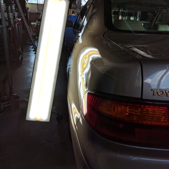 Dent Way PDR - '99 Avalon Before PDR - Mobile Dent Repair Near Me - Elk Grove Village, Illinois Dent Way PDR - '99 Avalon Before PDR - Mobile Dent Repair Near Me - Elk Grove Village, Illinois