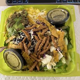 Tomato, Cucumber, Edamame, Cabbage, Chick Peas, Beans, Parmesan, Feta, Egg, Pumpkin Seeds, Sesame Sticks, Fresh Herb Vinaigrette, Avocado