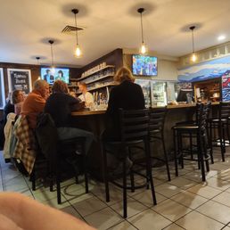 The bar area, featuring a variety of local drafts on tap!