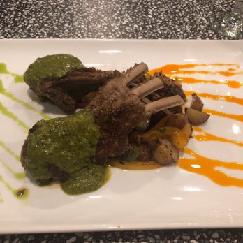 Cahill Bistro - Rack of lamb with chimichurri sauce. Literally cooked perfectly and one of the best sauces I've had! - Latin American Near Me - Edina, Minnesota Cahill Bistro - Rack of lamb with chimichurri sauce. Literally cooked perfectly and one of the best sauces I've had! - Latin American Near Me - Edina, Minnesota