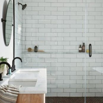 Esco Elite GC - a bathroom with a shower, sink, and mirror - Flooring Near Me - New York, New York Esco Elite GC - a bathroom with a shower, sink, and mirror - Flooring Near Me - New York, New York
