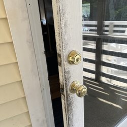Beach Realty & Construction & Kitty Hawk Rentals - Door to screened in porch