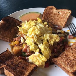 Breakfast skillet (home fries, sausage, bacon, cheese and veggies) I chose my eggs scrambled and the brown toast. Breakfast skillet (home fries, sausage, bacon, cheese and veggies) I chose my eggs scrambled and the brown toast.