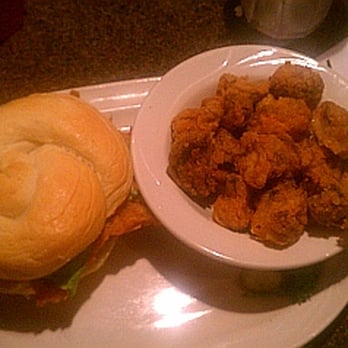 Sahm's Restaurant - The pork tenderloin sandwich with side of breaded mushrooms and creamy horseradish sauce.. - American Near Me - Fishers, Indiana Sahm's Restaurant - The pork tenderloin sandwich with side of breaded mushrooms and creamy horseradish sauce.. - American Near Me - Fishers, Indiana