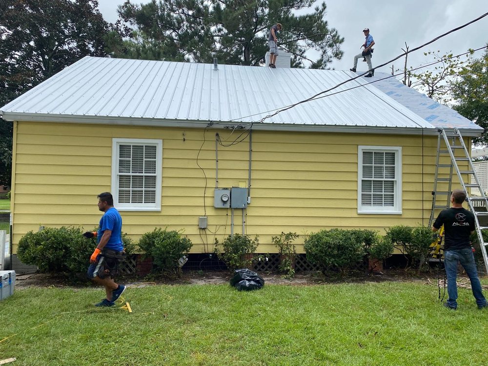 Slide of Alpha Roofing Services