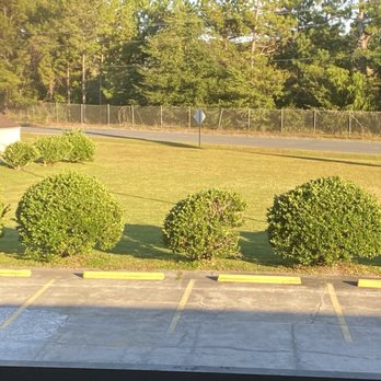 Motel 6 - Large mowed grassy area for your pets to use. - Hotels Near Me - Walterboro, South Carolina Motel 6 - Large mowed grassy area for your pets to use. - Hotels Near Me - Walterboro, South Carolina