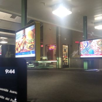 Sonic Drive-In - This shows the time in the car and the "Open" sign. They were still serving the three cars in front of us when we pulled out of the line. - Burgers Near Me - Cathedral City, California