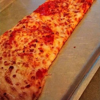 Big Lou's Pizza - Long trays for the slices. - Pizza Near Me - San Antonio, Texas Big Lou's Pizza - Long trays for the slices. - Pizza Near Me - San Antonio, Texas