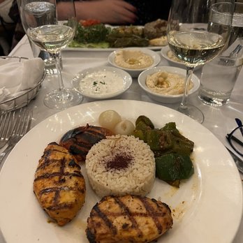 Cafe Santorini - Chicken breast kabob with side dishes - tatziki and HUMMUS - Italian Near Me - Pasadena, California Cafe Santorini - Chicken breast kabob with side dishes - tatziki and HUMMUS - Italian Near Me - Pasadena, California