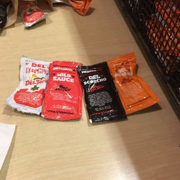 They have 3 hot sauces but the mild one is not spicy. They have 3 hot sauces but the mild one is not spicy.