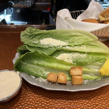 Vito's Chop House - Caesar salad with dressing on the side - Italian Near Me - Orlando, Florida Vito's Chop House - Caesar salad with dressing on the side - Italian Near Me - Orlando, Florida