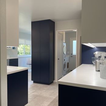 Clark Builders - Modern Kitchen Complete Remodel. Beautiful custom cabinets finished with cool white uppers and navy lowers. - General Contractors Near Me - Lompoc, California Clark Builders - Modern Kitchen Complete Remodel. Beautiful custom cabinets finished with cool white uppers and navy lowers. - General Contractors Near Me - Lompoc, California