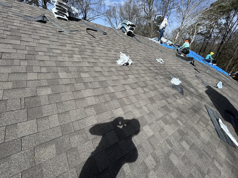 Slide of Monarch Roofing