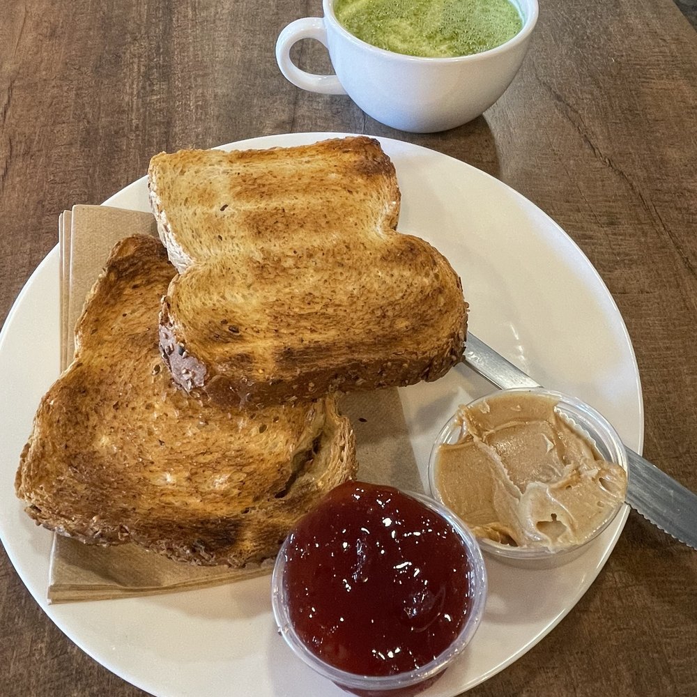 Caffe Reggio - a plate of toast and a bowl of sauce - Cafes Near Me - Coquitlam, British Columbia Caffe Reggio - a plate of toast and a bowl of sauce - Cafes Near Me - Coquitlam, British Columbia