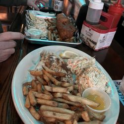 Fish fry dinners come with slaw, mac salad and fries. Fries were really tasty!