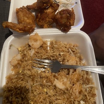 Happy Garden 2 - a tray of rice and chicken with a fork - Chinese Near Me - Lake Worth, Florida Happy Garden 2 - a tray of rice and chicken with a fork - Chinese Near Me - Lake Worth, Florida