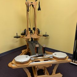 Balance, Your Pilates and Yoga Studio - The Traditional Pulley Tower. Designed by Juliu Horvath himself, this apparatus uses cables & weights to orchestrate your Gyrotonic workout!