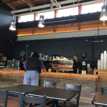Jibe Espresso Bar - a man working behind the counter - Coffee & Tea Near Me - Seattle, Washington Jibe Espresso Bar - a man working behind the counter - Coffee & Tea Near Me - Seattle, Washington
