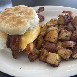 Chicken tender breakfast biscuit and home fries