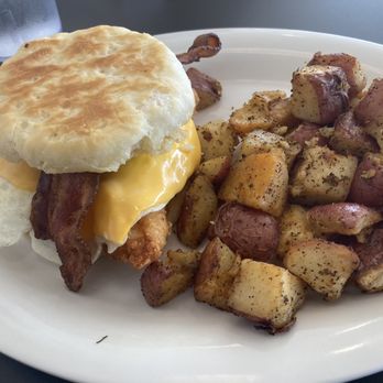 Eggs Up Grill - Chicken tender breakfast biscuit and home fries - Breakfast & Brunch Near Me - Dallas, Texas