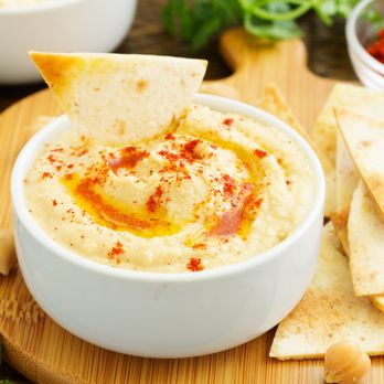 Mercy Seat Kitchen - Home-made Hummus dip with crunchy bread - Middle Eastern Near Me - Baltimore, Maryland Mercy Seat Kitchen - Home-made Hummus dip with crunchy bread - Middle Eastern Near Me - Baltimore, Maryland