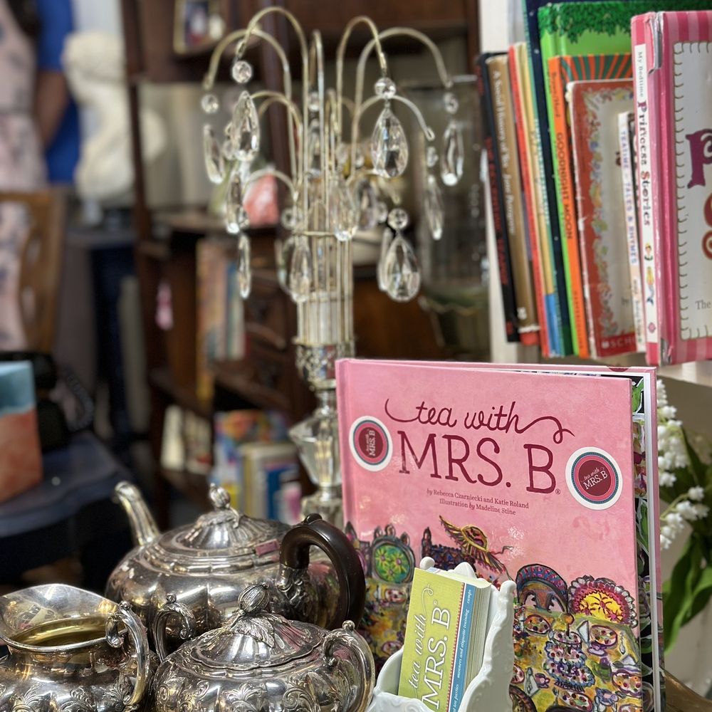 teapots and books on a table