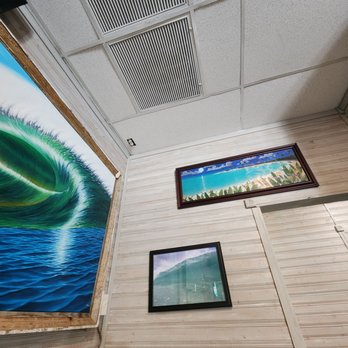 Sharky's - a picture of a large wave coming in from the ocean - American Near Me - Fort Pierce, Florida