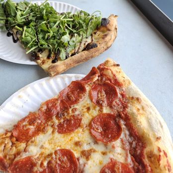 Claudio's Pizza - Pepperoni Pizza  Fungi Quatro Formaggi slice with roasted mushrooms, gargonzola, Fontini, ricotta, Reggiano and Arugula - Pizza Near Me - Greenport, New York