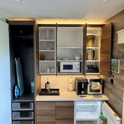 Studio 1080 Hollywood - Coffee bar with Jura Micro Ana 1 whole bean espresso machine, air fryer, microwave, electric kettle, dishes, iron/ironing board.