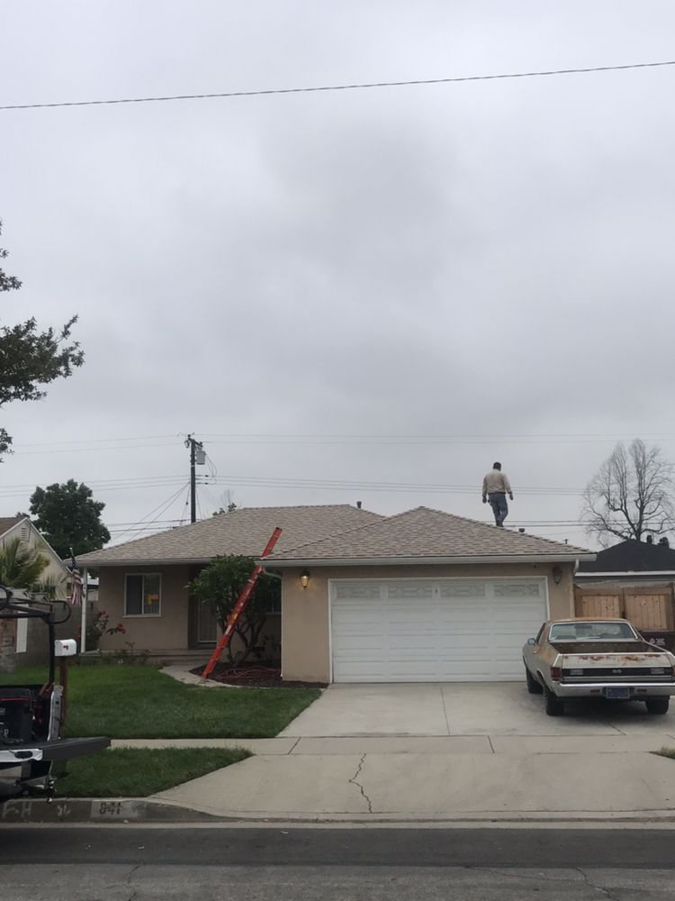 Slide of MA Roofing and Gutters