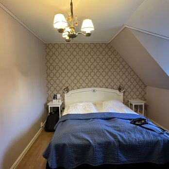 Toftaholm Herrgård - The initial small room we were given for 3 adults - Hotels Near Me - Vittaryd, F