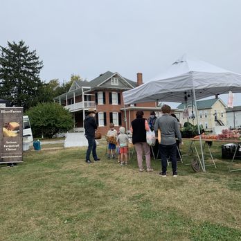 Field Fresh Farmers Market - people standing under tents - Farmers Market Near Me - Frederick, Maryland