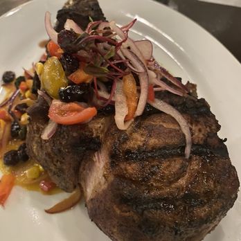 Hugo's Invitados - Pork Tomahawk - Seafood Near Me - Irving, Texas Hugo's Invitados - Pork Tomahawk - Seafood Near Me - Irving, Texas