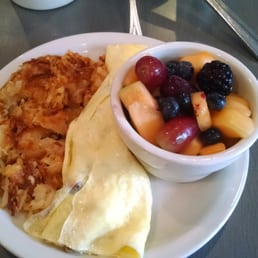 Hash browns , fruit cup and a veggie omlete.... Yum!!!! Hash browns , fruit cup and a veggie omlete.... Yum!!!!