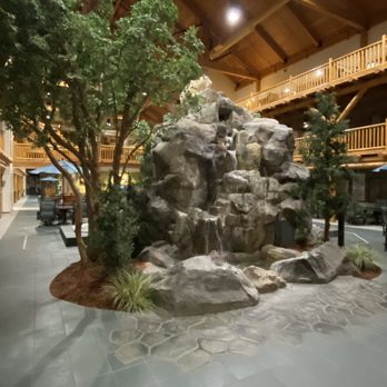 C'Mon Inn - Part of the atrium area with a waterfall. - Hotels Near Me - Missoula, Montana